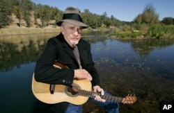 FILE - Merle Haggard poses at his ranch at Palo Cedro, Calif., Oct. 2, 2007.