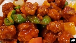 This Nov. 28, 2019, photo shows a plate of sweet and sour pork served at a Chinese restaurant in New York City. 