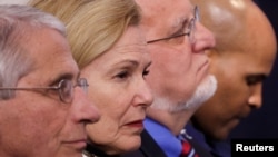 Para anggota Gugus Tugas Covid-19 Gedung Putih dari kiri: Dr. Anthony Fauci (NIH), Dr. Deborah Birx, Direktur CDC Robert Redfield dan Jerome Adams. 