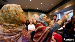 Jenny Yanez yells during a town hall meeting with Republican U.S. Senator Bill Cassidy in Metairie, Louisiana, Feb. 22, 2017.
