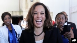 FILE - U.S. Sen. Kamala Harris, D-Ca., leaves a campaign event at Miami Dade College in Miami, Oct. 29, 2018.