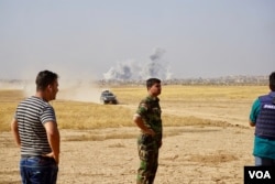 A massive airstrike on a building in the center of Bashiqa, Iraq, killed the local IS emir, Nov. 7, 2016. (J. Dettmer/VOA)