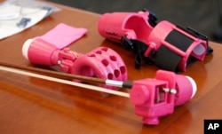 A new prosthetic hand awaits Isabella Nicola Cabrera, 10, at the engineering department of George Mason University in Fairfax, Virginia, April 20, 2017.