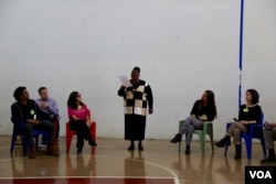 Pastor Johnson recites “My Continuing Passion” before an audience of Stella Adler Studio of Acting actors and inmates at Rikers Island, New York.