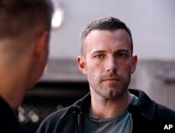 (L-r) JEREMY RENNER as Jem Coughlin and BEN AFFLECK as Doug MacRay in Warner Bros. Pictures’ and Legendary Pictures’ crime drama “The Town,” distributed by Warner Bros. Pictures.