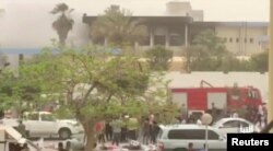 The site of suicide attack on Libyan electoral commission is seen in Tripoli, Libya, May 2, 2018 in this still picture obtained from social media video. (Al-Nabaa Channel/via Reuters)
