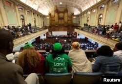 People listen from the gallery as the Constitutional Review Committee hold public hearings regarding expropriation of land without compensation in Pietermaritzburg, South Africa, July 20, 2018.