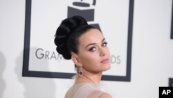 Katy Perry arrives at the 56th annual Grammy Awards at the Staples Center, Jan. 26, 2014, in Los Angeles.