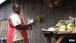 Charity Nyambura was one of 25 food vendors in Viwandani who received basic food safety training. (Credit: S. Baragona/VOA)