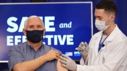 Vice President Mike Pence receives a Pfizer-BioNTech COVID-19 vaccine shot at the Eisenhower Executive Office Building on the White House complex, Friday, Dec. 18, 2020, in Washington. Karen Pence, and U.S. Surgeon General Jerome Adams also participated.