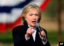 FILE - Democratic presidential candidate Hillary Rodham Clinton speaks during a campaign stop at the Westfair Amphitheater in Council Bluffs, Iowa, Oct. 7, 2015.