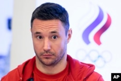 Russia national ice hockey team captain Ilya Kovalchuk listens to a journalist's question during a news conference in Moscow, Russia, Dec. 12, 2017.