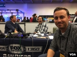 The Fox Sports radio team assembles for one of it myriad shows, on Radio Row for Super Bowl 50, at the Moscone Convention Center in San Francisco, Feb. 5, 2016. (P. Brewer/VOA)