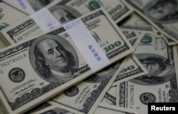 The U.S. dollar traded higher against most other currencies in December.