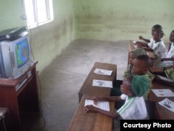 Students watch "Sesame Square" in Ijebu-Lekki, Nigeria, in February 2012. Creators of "Sesame Square" feared being targeted by Boko Haram. (N. Moland)