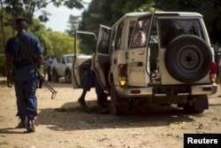 A policeman walks at the crime scene where Burundian General Athanase Kararuza was attacked and killed by unknown gunmen in Ntahangwa commune, north of the capital Bujumbura, April 25, 2016.
