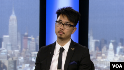 自由撰稿人周君鸿(Eugene K Chow)