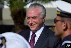 Brazil's President Michel Temer receives military honors during ceremony, in Brasilia, June 9, 2017.