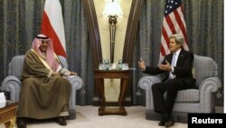 U.S. Secretary of State John Kerry (R) meets with Kuwait's Foreign Minister Sheikh Sabah Al-Sabah at a hotel in Riyadh, March 4, 2013. 