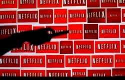 FILE - The Netflix logo is shown in this illustration photograph, Oct. 14, 2014.