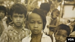 Photo of a group of young boys captured by Michael Vickery during the 1960s was displayed in a photo exhibition in Bophana Centre, Thursday October 11, 2018. (Nem Sopheakpanha/VOA Khmer)