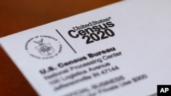 FILE - This April 5, 2020, photo shows an envelope containing a 2020 census letter mailed to a U.S. resident in Detroit. 