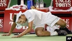 FILE - Andy Roddick of the U.S. gets up off the court following his match against Younes El Aynaoui of Morocco at the Australian Open tennis tournament, Wednesday, Jan. 22, 2003, in Melbourne. Roddick won 4-6, 7-6, 4-6, 6-4, 21-19. (AP Photo/David Callow)