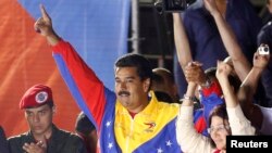 Venesuela muvaqqat rahbari Nikolas Maduro prezident saylovlarida g'olib bo'ldi, Karakas, 14-aprel, 2013-yil. 
