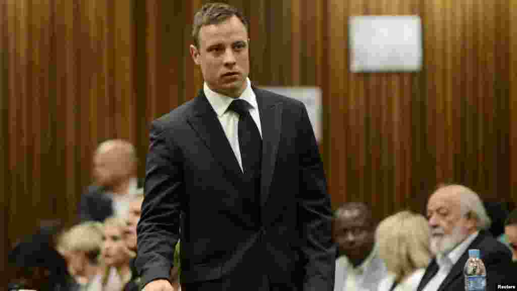 South African Olympic and Paralympic track star Oscar Pistorius attends his sentencing at the North Gauteng High Court in Pretoria, October 21, 2014.