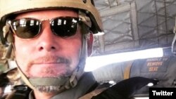 NPR's David Gilkey is seen on assignment in a photo posted May 17, 2016, by a colleague on Twitter (via @MEvstatieva).