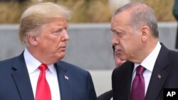 Presiden AS Donald Trump saat bertemu Presiden Turki Recep Tayyip Erdogan di sela KTT NATO di Brussels, Belgia 11 Juli 2018 lalu. 