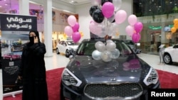 A Saudi woman is seen at the first automotive showroom solely dedicated for women in Jeddah, Saudi Arabia Jan. 11, 2018. (REUTERS/Reem Baeshen)