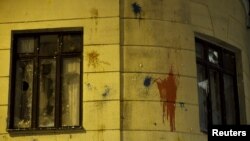 Windows of Turkish embassy smashed in reaction to downing of Russian war plane, Moscow, Nov. 25, 2015.