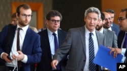 Security Council President Gustavo Meza-Cuadra (2nd-L) walks with other members of a U.N. Security Council team upon arrival at Naypyitaw International Airport in Naypyitaw, Myanmar, April 30, 2018. 