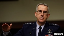 FILE - U.S. Air Force General John Hyten, commander of U.S. Strategic Command, testifies in a Senate Armed Services Committee hearing on Capitol Hill in Washington, April 4, 2017.