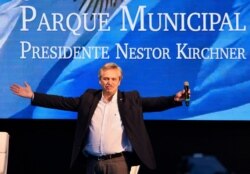 FILE - Argentine presidential candidate Alberto Fernandez acknowledges the audience during a campaign rally in Buenos Aires. May 25, 2019.