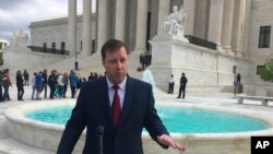 Food Marketing Institute lawyer Evan Young speaks to reporters outside the Supreme Court after the high court heard arguments in the supermarket trade association’s case Monday, April 22, 2019, in Washington. FMI is arguing that the government…
