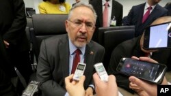 FILE - Nelson P. Martinez, the People's Minister of Petroleum from Venezuela, speaks to journalists before an OPEC meeting in Vienna, Austria, May 25, 2017.