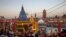 Devotees gather for an evening prayer on the banks of Ganges river during Kumbh Mela, or the Pitcher Festival, amidst the spread of the coronavirus disease (COVID-19), in Haridwar, India, April 10, 2021. REUTERS/Danish Siddiqui