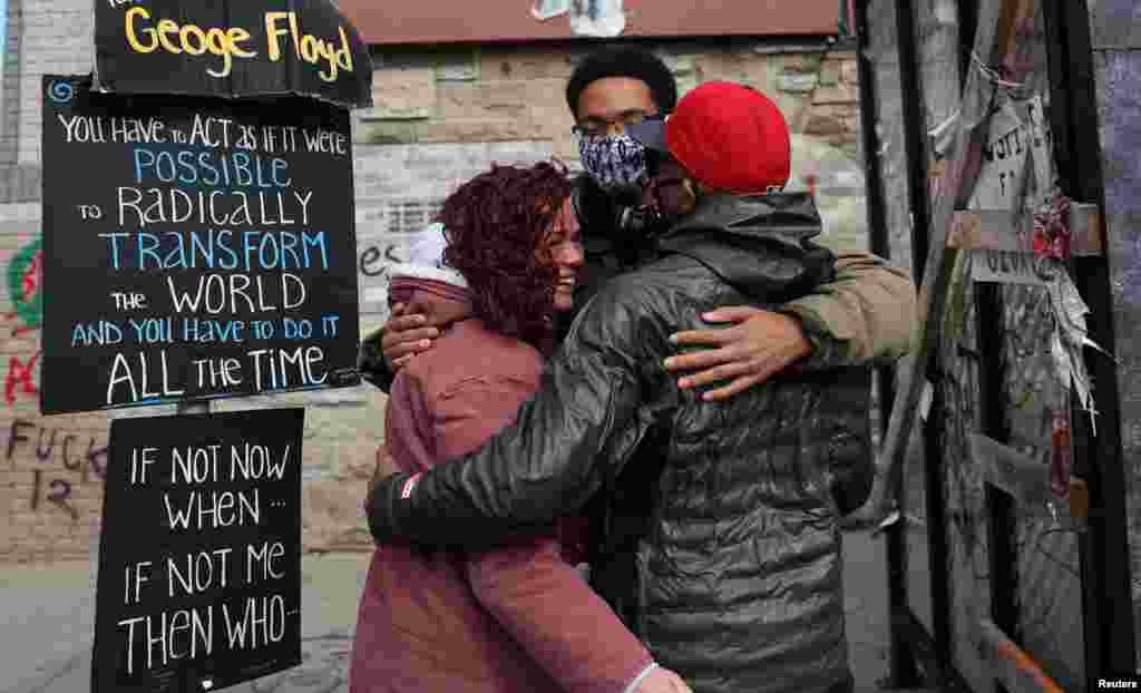 People react after the verdict in the trial of former Minneapolis police officer Derek Chauvin, found guilty of the death of George Floyd, at George Floyd Square in Minneapolis, Minnesota.