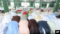 Nigeria Muslims offer prayers during Eid al-Adha prayers to mark the end of the holy month of Hajji.