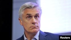 资料照：迈克尔·卡维参加圣彼得堡国际经济论坛会议。(2018年5月24日)