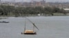 A traditional felucca sailing boat transits the Nile river in Cairo, Egypt, January 22, 2013.