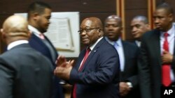 Former South African President Jacob Zuma, center, is seen in the High Court in Pietermaritzburg, South Africa, Oct. 11, 2019.