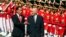 Afghanistan's President Mohammad Ashraf Ghani (R), accompanied by Indonesia's President Joko Widodo, inspects the guard of honor during a welcoming ceremony at the Presidential Palace in Jakarta, Indonesia, April 5, 2017.