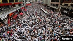 Demonstrators attend a protest to demand authorities scrap a proposed extradition bill with China, in Hong Kong, China June 9, 2019. (REUTERS/Tyrone Siu)