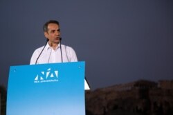 Main opposition New Democracy conservative party leader Kyriakos Mitsotakis addresses supporters during a pre-election rally in Athens, July 4, 2019.