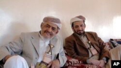 Tribal leader Sheikh Ghaleb al-Ashdaa of the Murad, and his son Khaled
al-Ashdaa, in Sana'a. Both men favor government negotiations with
Yemeni militants. January 10, 2010.