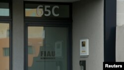 FILE - The office of Malta's Financial Intelligence Analysis Unit (FIAU), an anti-money laundering agency, is seen in Birkirkara, Malta, Oct. 28, 2017. 