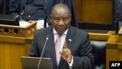 Le président sud-africain Cyril Ramaphosa s'adresse au Parlement sud-africain le 22 mai 2019 au Cap. (Photo by RODGER BOSCH / AFP)